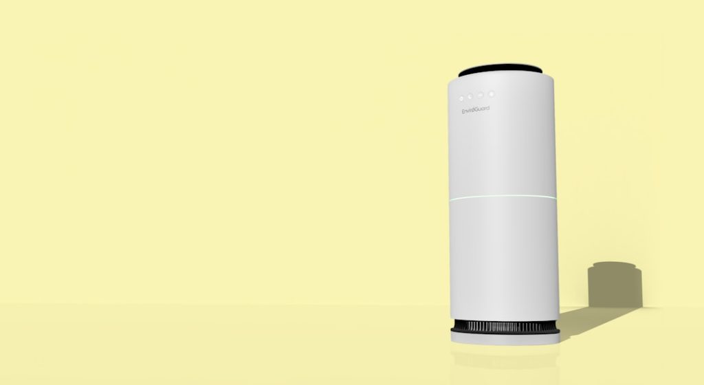 Purificateur d'air blanc posé au sol dans un intérieur lumineux, utilisé contre les allergies domestiques